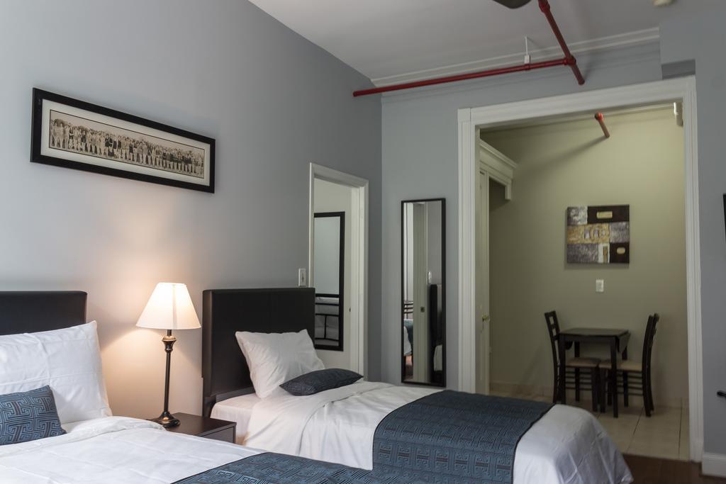Quarto Triplo Standard com Banheiro Compartilhado
