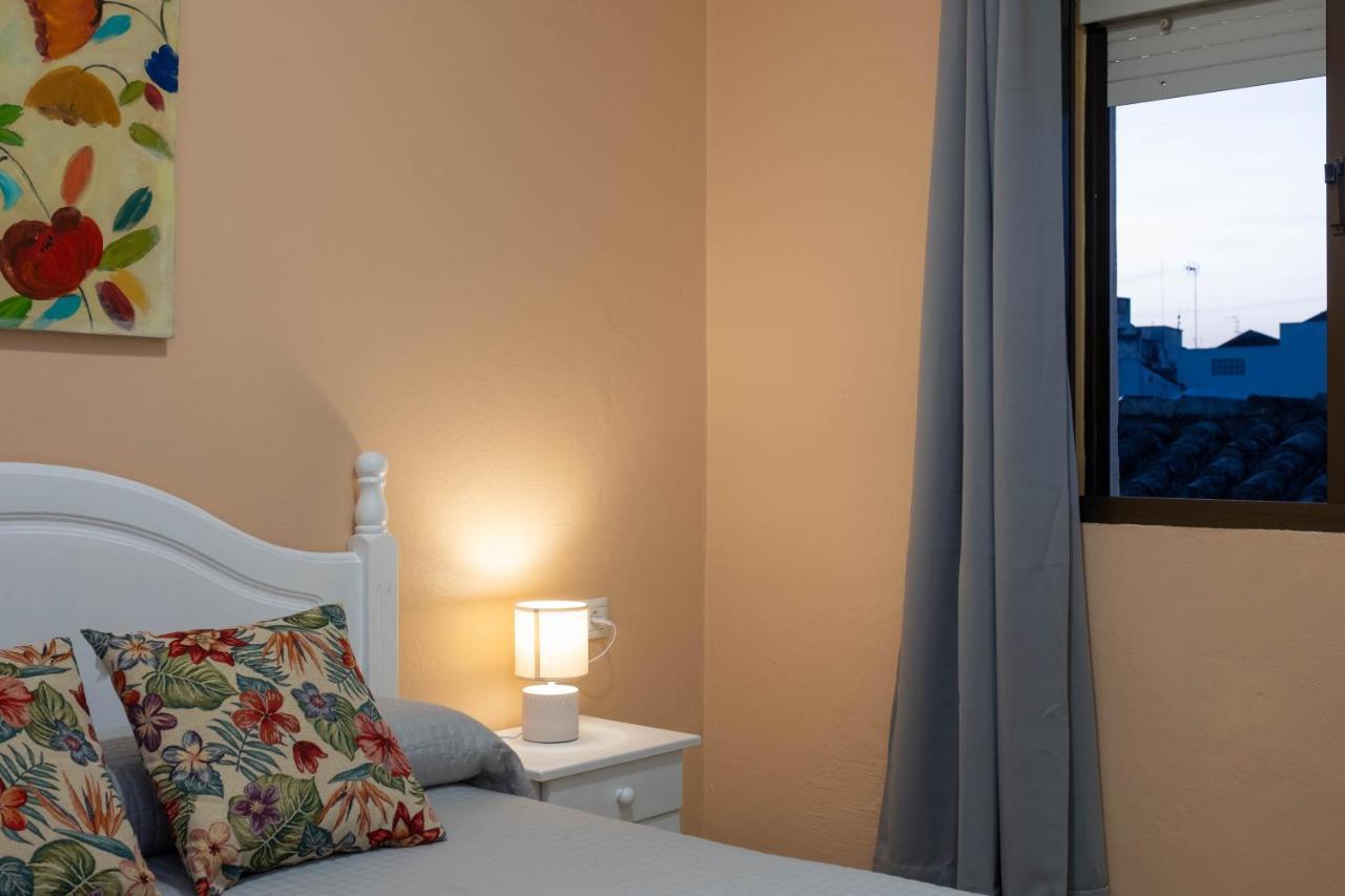 Kamer met 1 Groot Bed of 2 Aparte Bedden en Uitzicht op de Stad