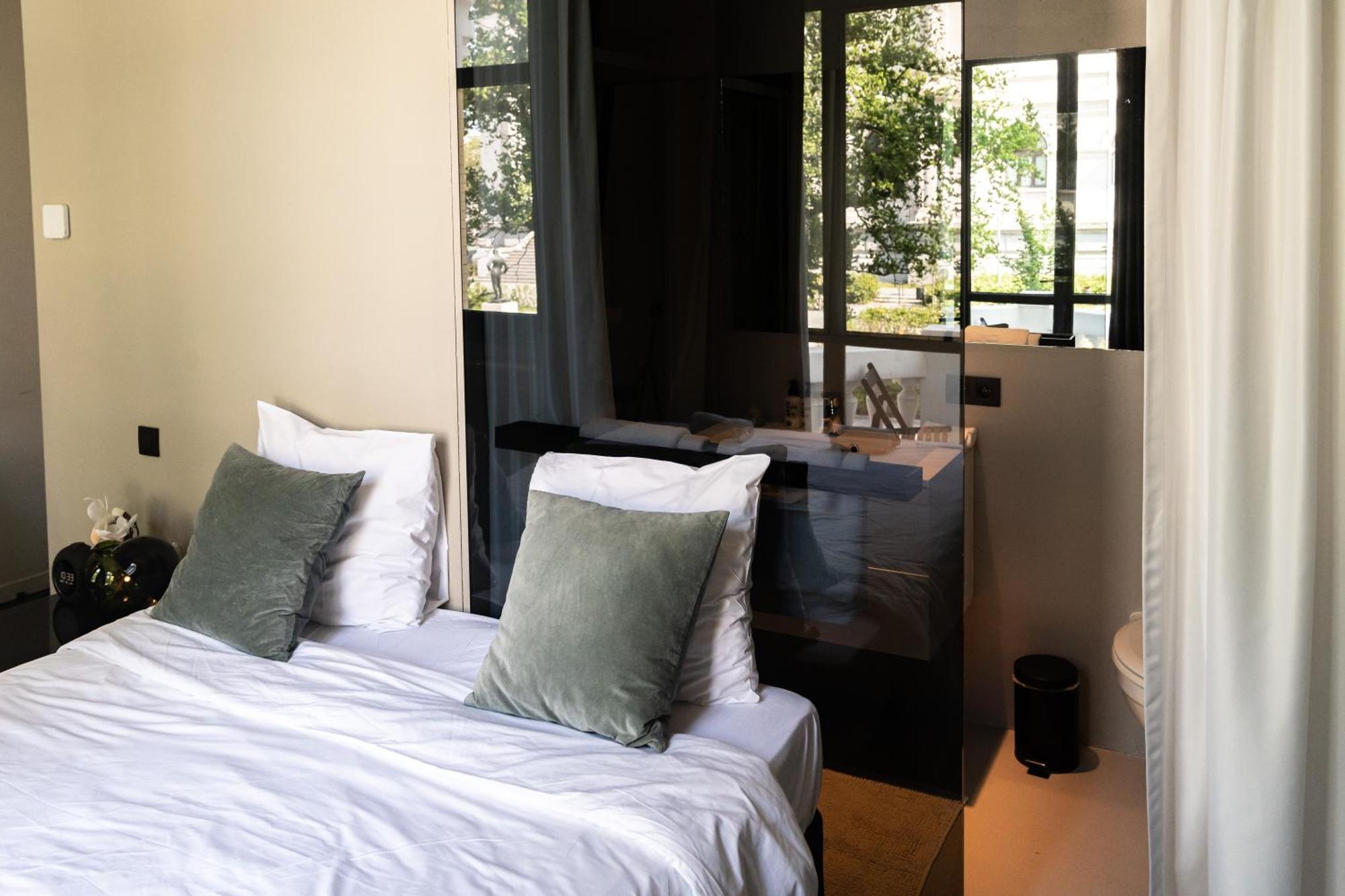 Kamer met Queensize Bed en Balkon