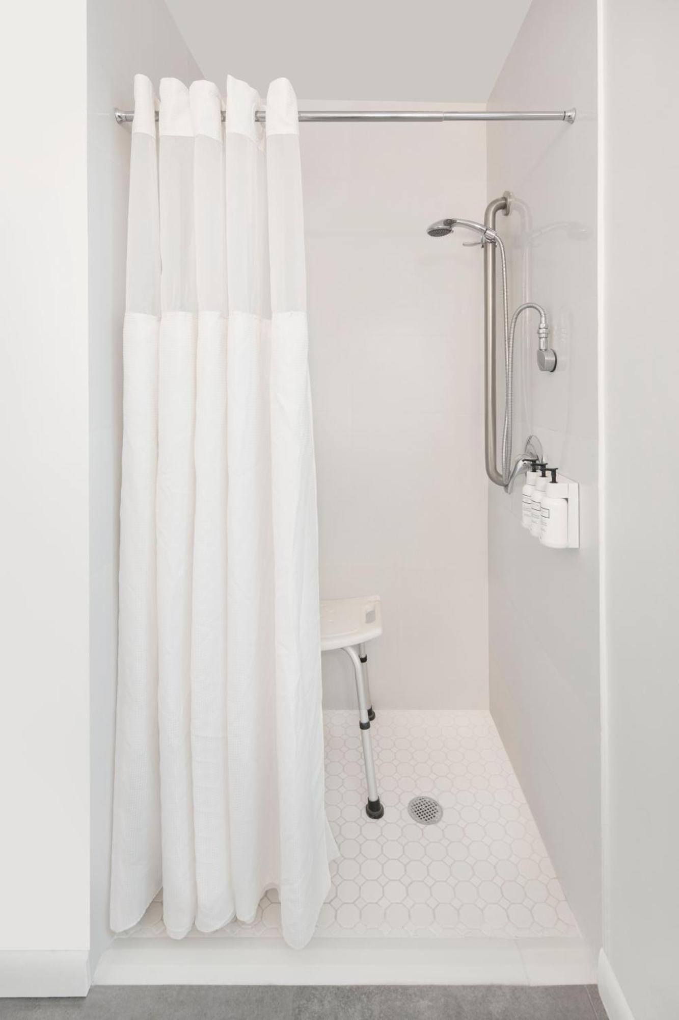 1 King Bed Mobility or Hearing Accessible Room Roll Shower Non-Smoking