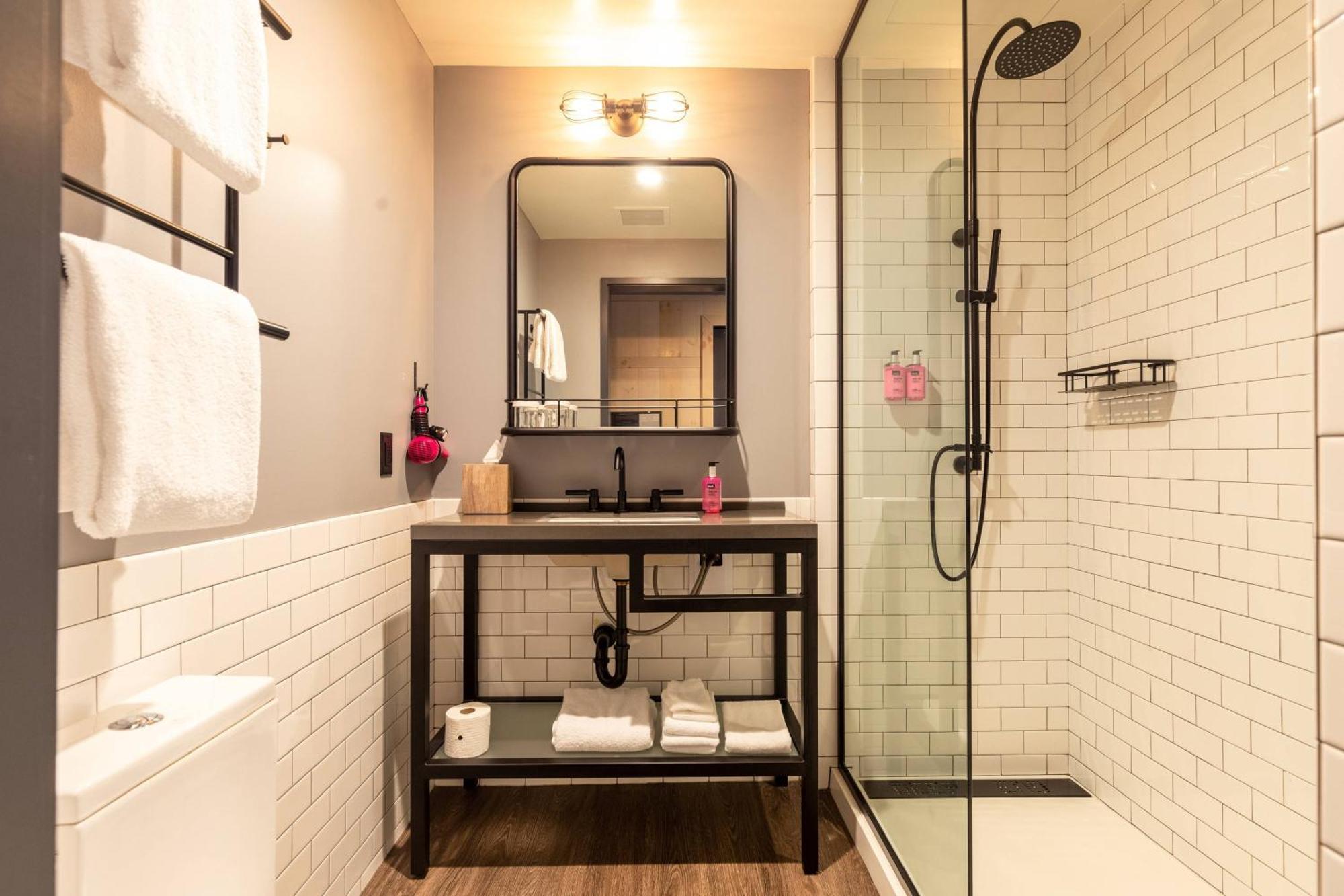 Queen Room with Two Queen Beds and Street View - Hearing Accessible