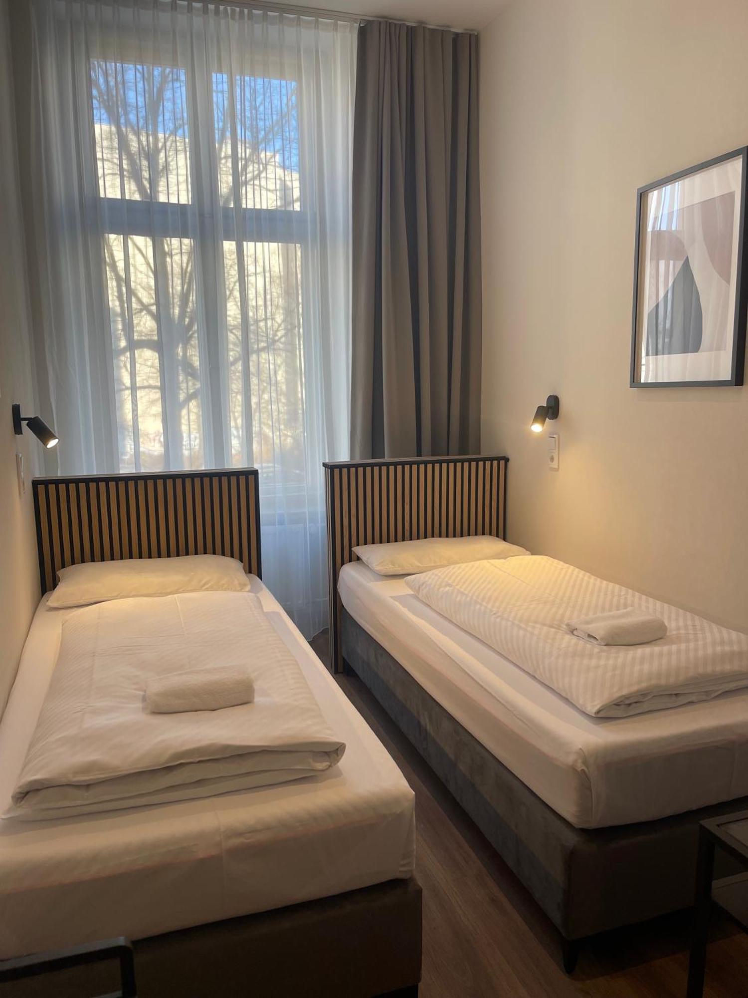 Tweepersoonskamer met 2 Aparte Bedden