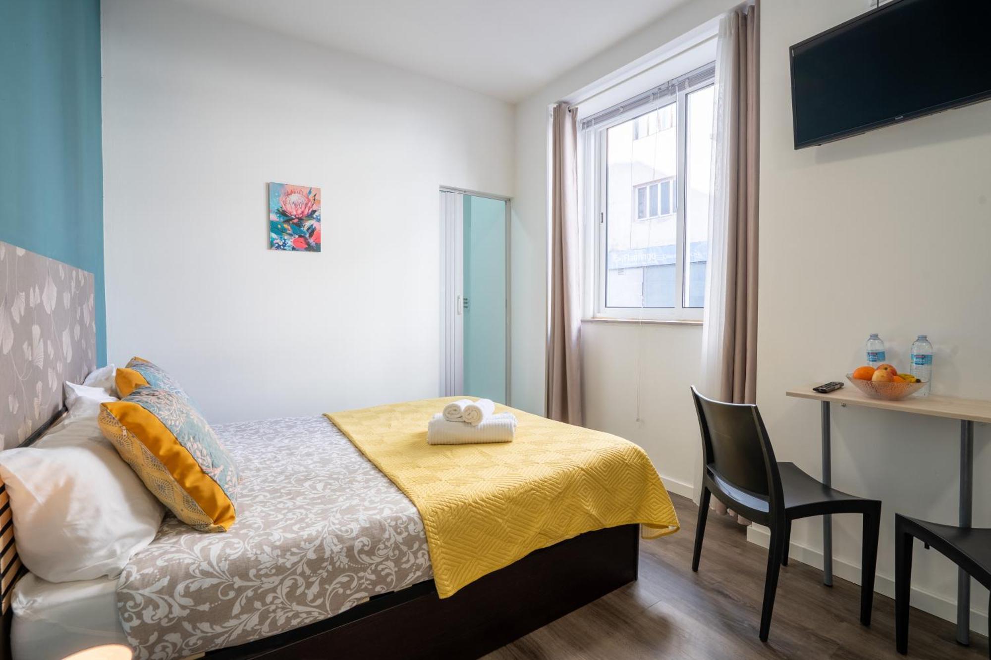 Quarto Duplo com Casa de Banho Privativa