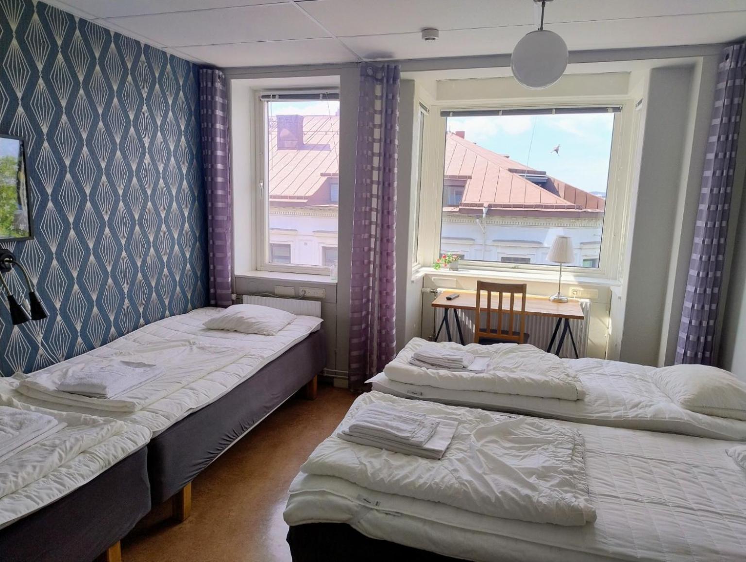 Vierpersoonskamer met Gedeelde Badkamer