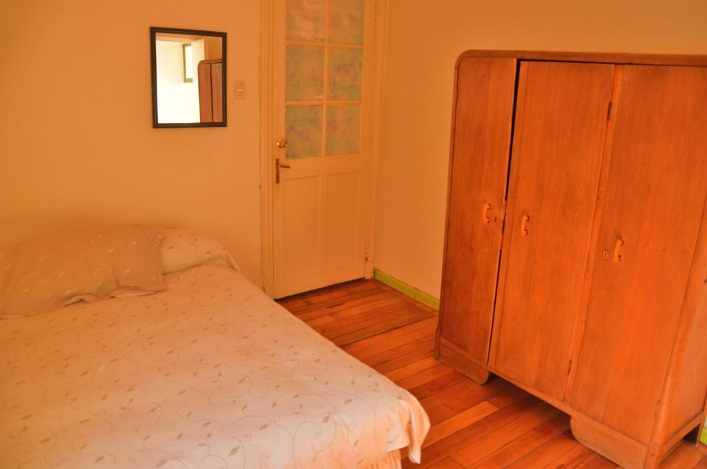 Quarto Premium com Cama King-size e Banheiro Privativo