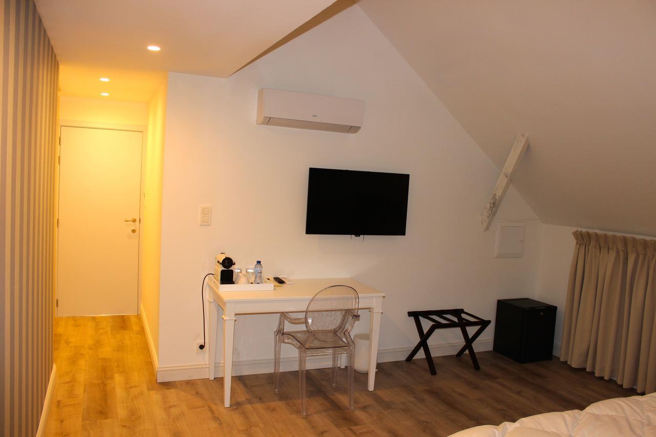 Suite met een Kingsize Bed en een Bad