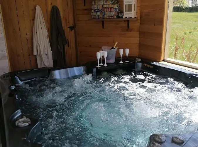 Chambre avec jacuzzi privatif le pêcher